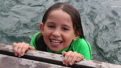 Girl Smiling on Dock