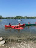 Campers out on the water in canoes