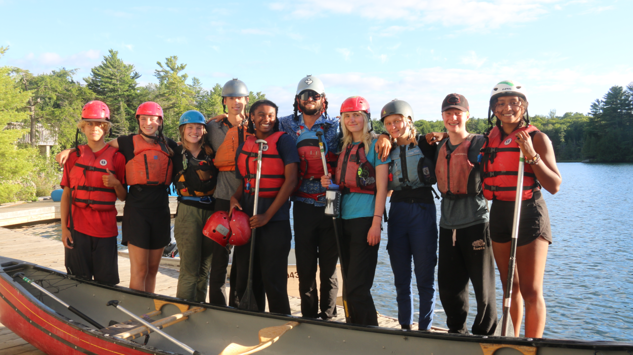 : Leadership campers gathered outdoors at Y M C A Camp Pine Crest in 2024.