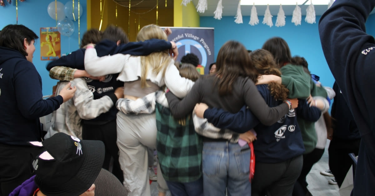 A group of youth dancing