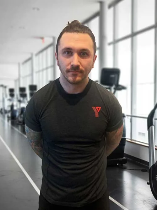 kyle standing in the gym