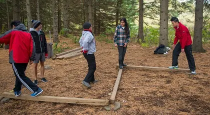 Group working on low ropes activity