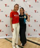 Sarah Wells poses with Sherry Perez holding her silver medal.