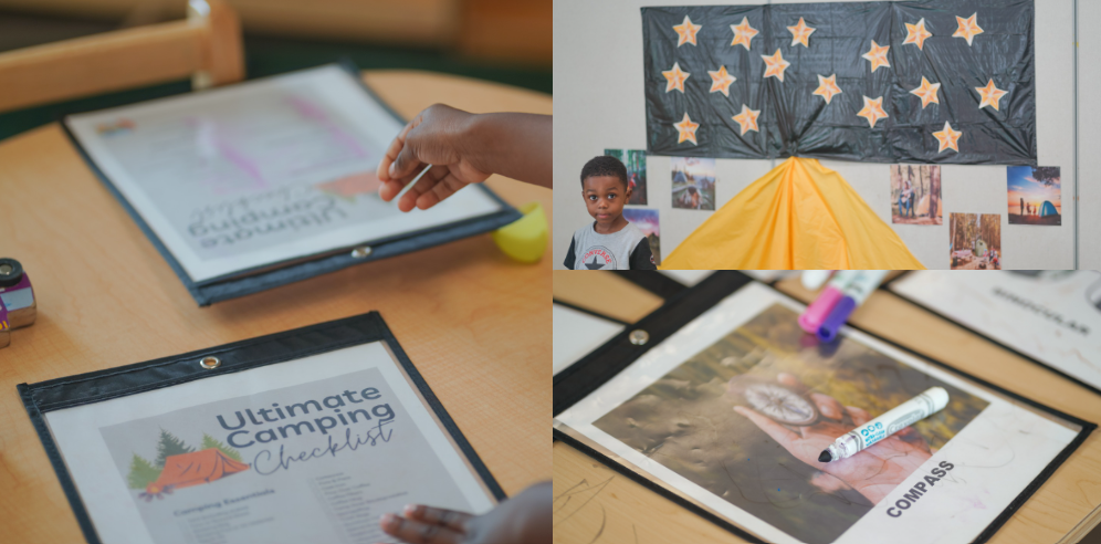 A camping programming setup at Brampton YMCA Child Care centre with a starry night sky and a flattened yellow tent on the wall. On the wooden round table are a printed Ultimate Camping Checklist and a photo of a child's hand holding a compass. 