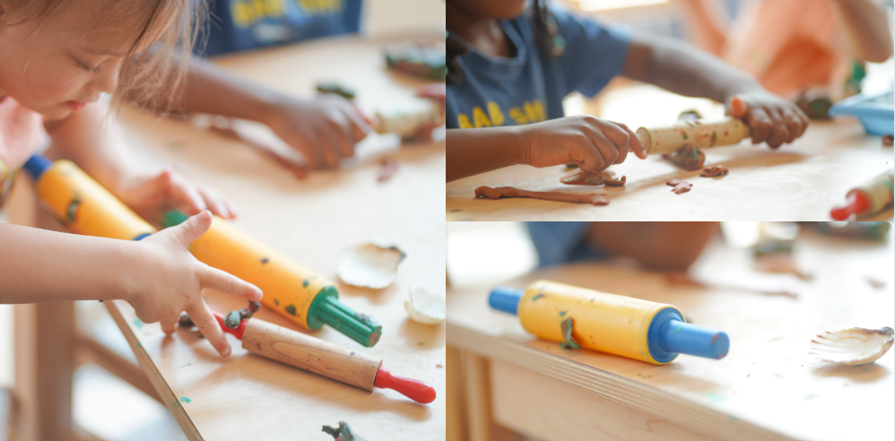 A Playdough programming setup at Brampton YMCA Child Care centre. Children use colourful rolling pins on the playdough. 
